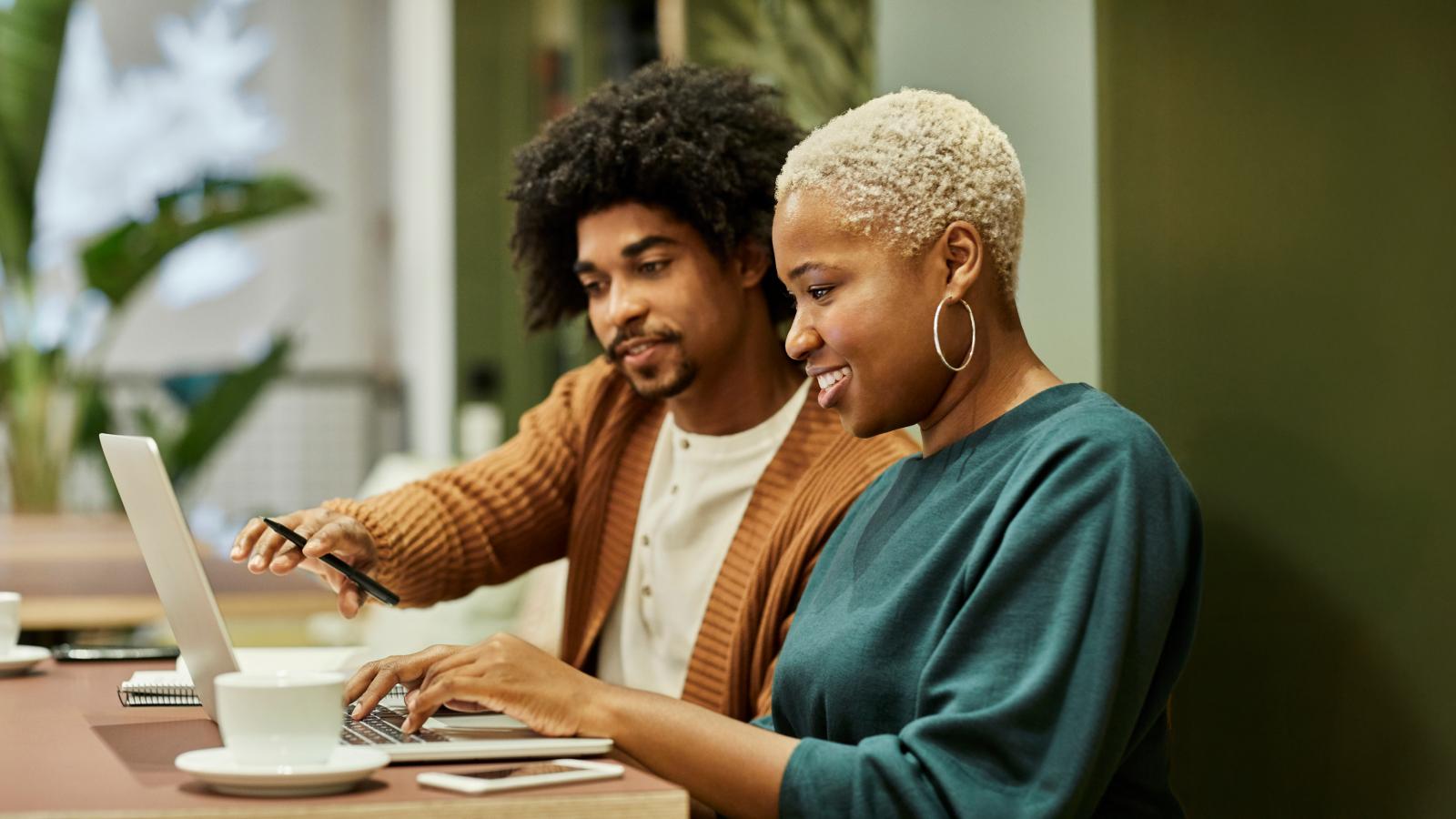 Coworkers are discussing during meeting