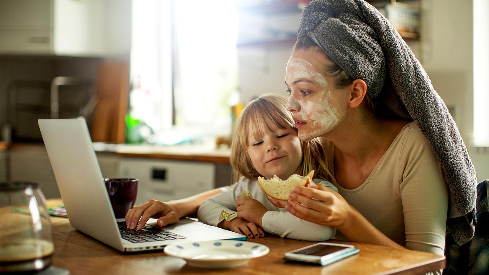 Mother and daughter having breakfast