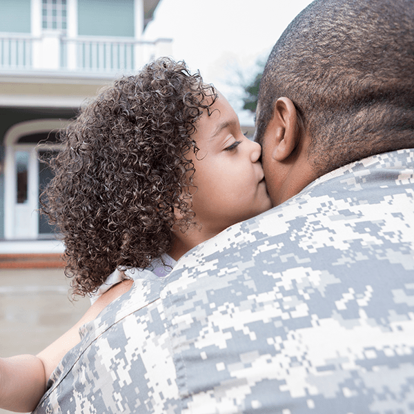 Servicemember with child.