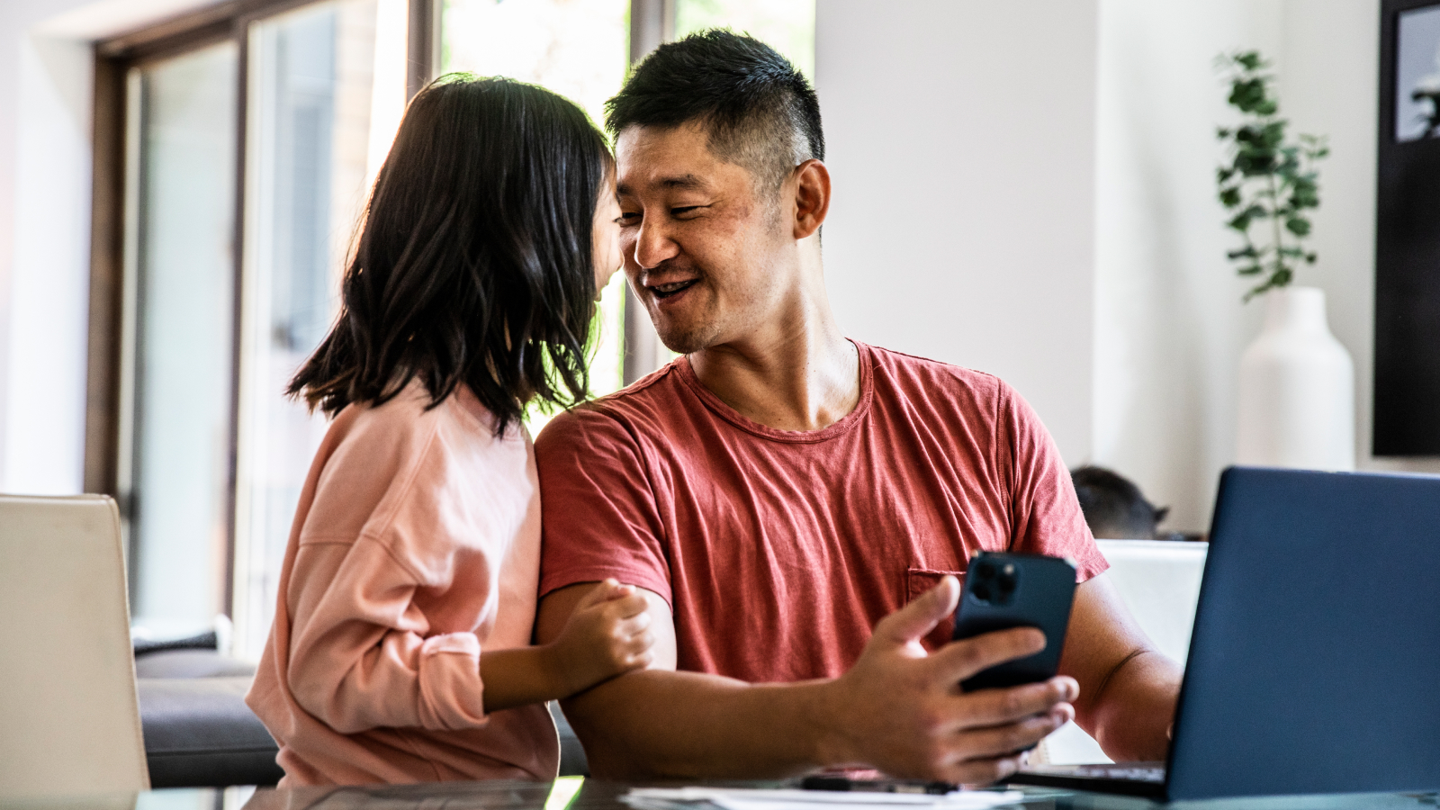 Father and daughter laughing