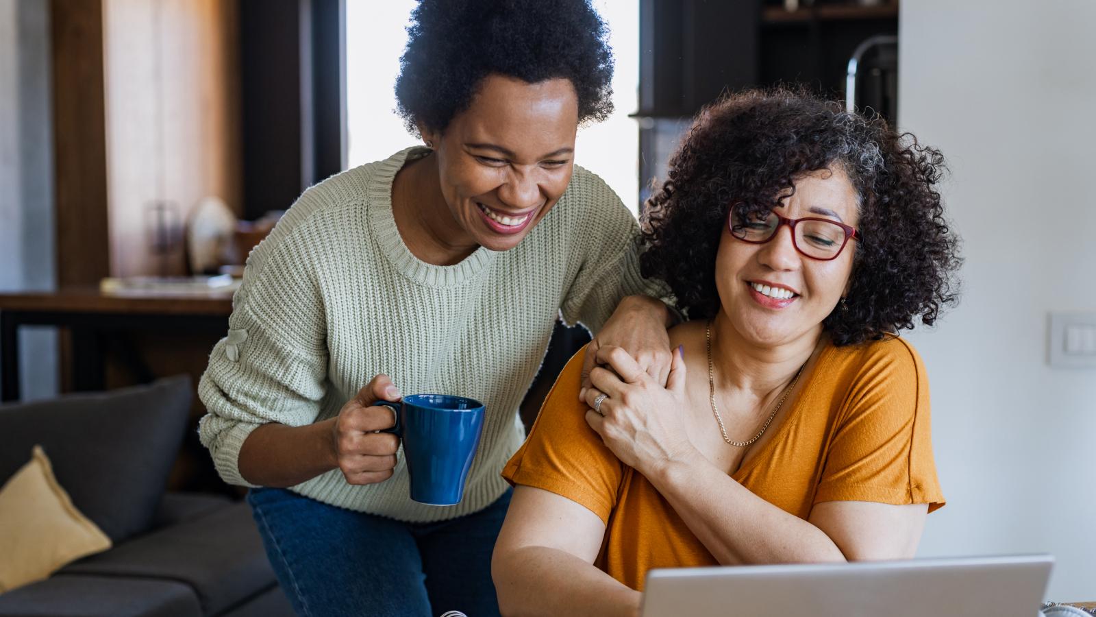 Couple looking at a laptop