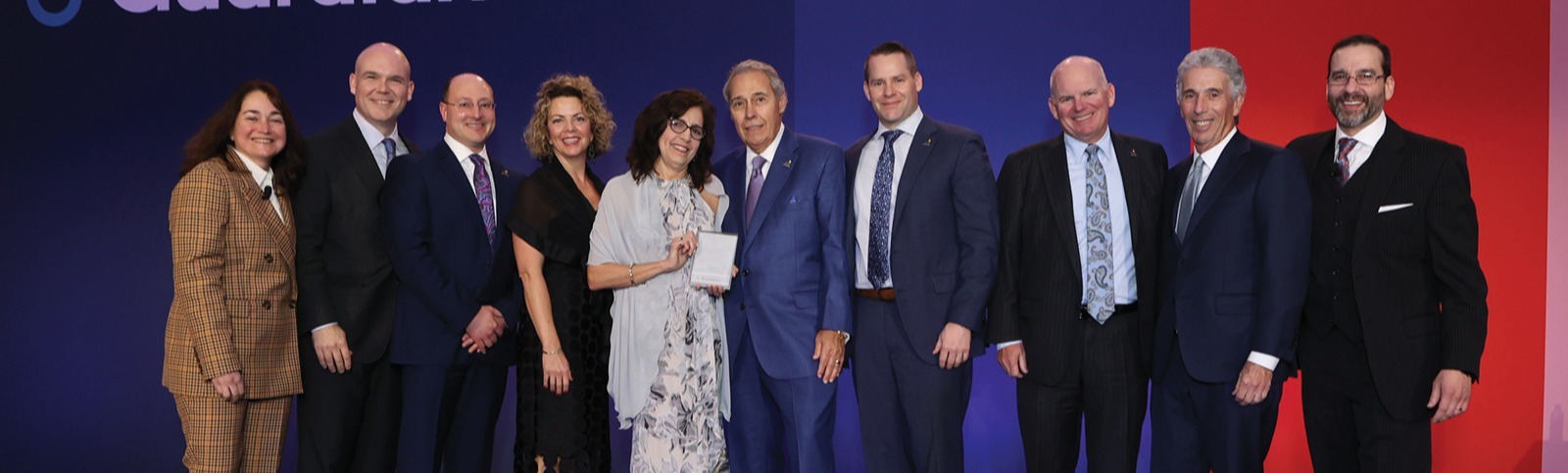 GA-Platinum-winner Lifetime Financial Growth, led by Tom Wyatt, Eric Startare, Danielle Swann, MaryLou Rodgers, Earl Luttner, Greg Kreiner, Matty Roddy, and Sandy Aderson, joined by Leyla Lesina on the left and Tim O’Donnell on the right