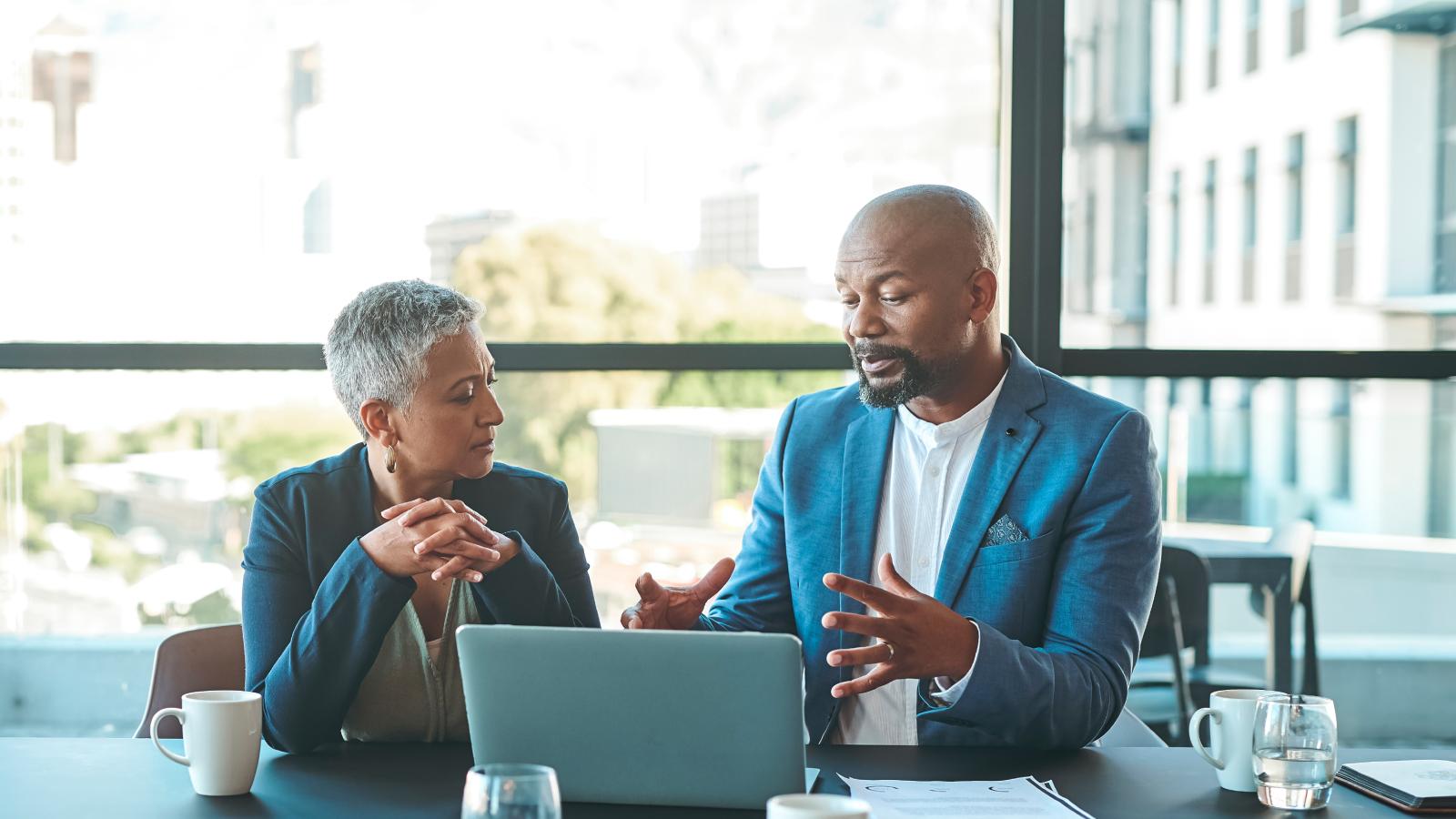 Broker speaking with client