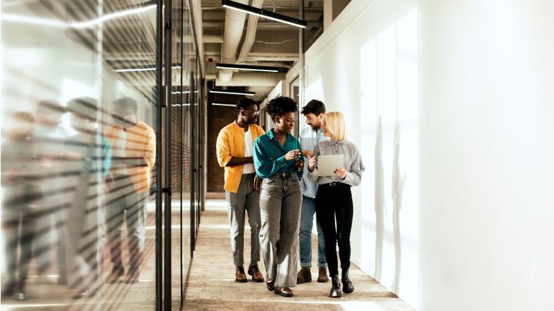 Employees walking down a hallway